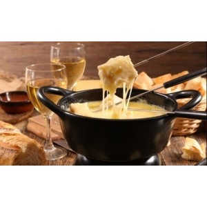 promo Fondue savoyarde salade verte et coupe de champagne pour 2 personnes